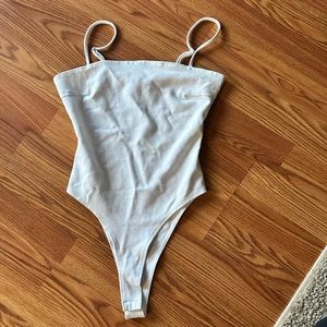 White tank (bottom clips)